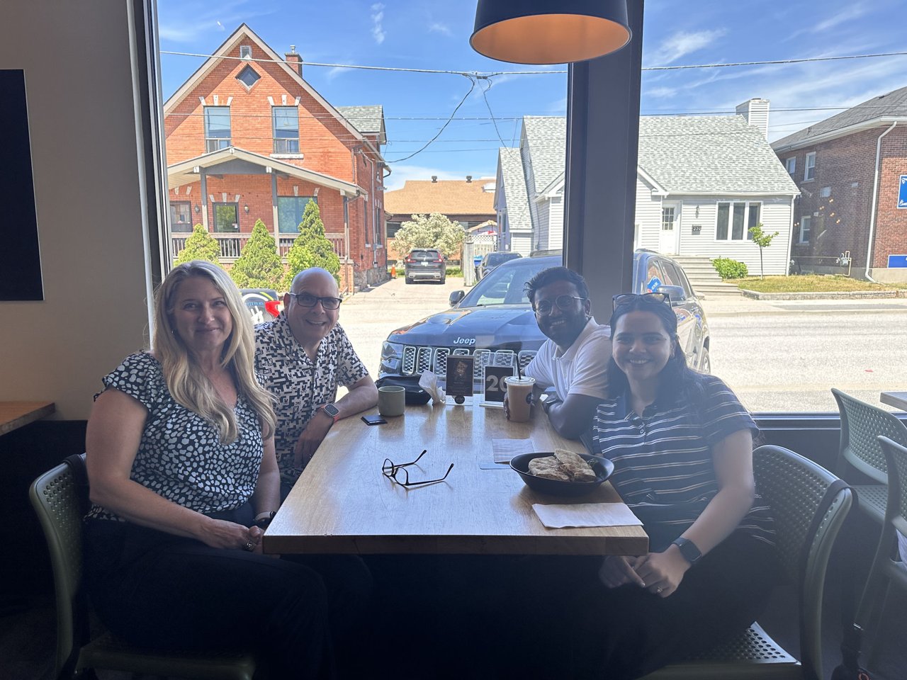 Paul Meyers and Adarsh, Brinda & Christine at a 52 Coffees meeting